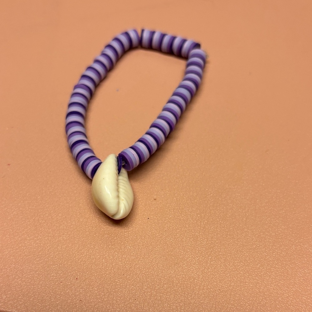 Purple and White Beaded Bracelet with Shell Charm